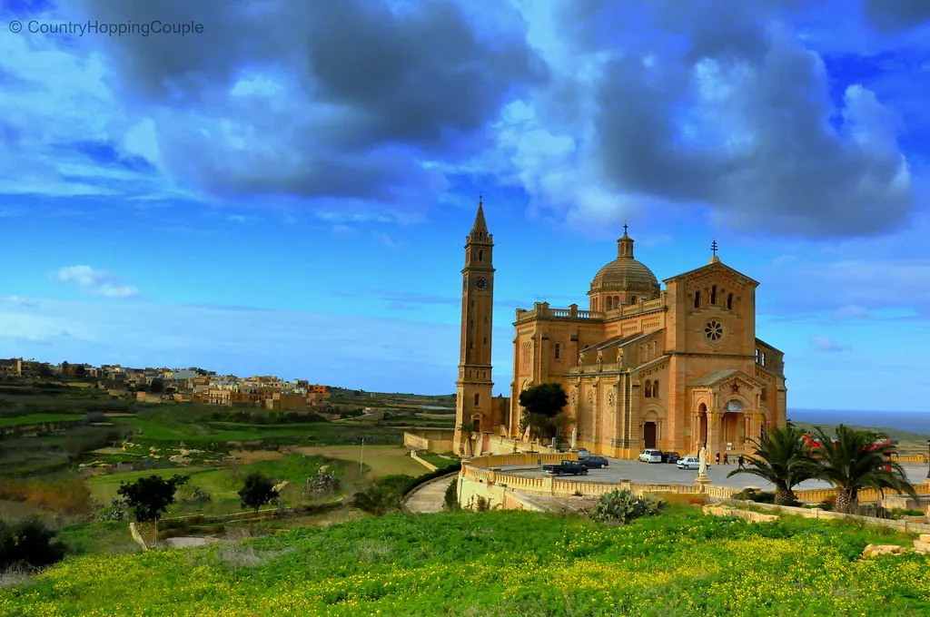 A photo of the Ta' Pinu Basilica against the backdrop of the Gozitan countryside.