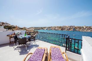 GetawaysMalta - Harbour Lights Seafront Penthouse with Terrace St Pauls Bay – The Best Apartment/Flat in St. Paul's Bay