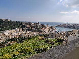 Panoramic Penthouse enjoying sea and country views – The Best Apartment/Flat in Marsascala